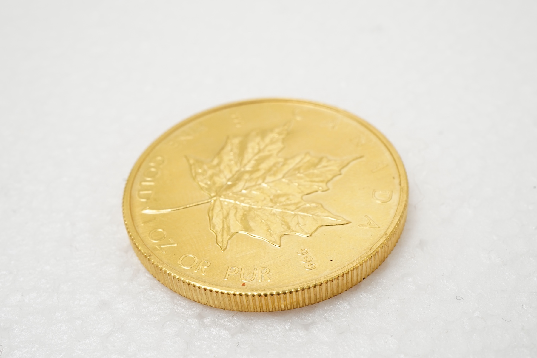 An Elizabeth II gold Canadian 50 dollar coin, 1982